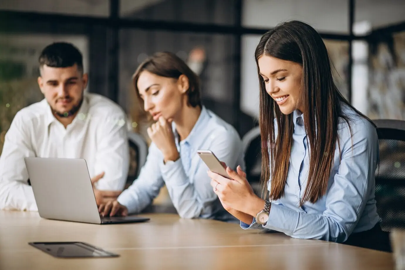 A group of people developing a business plan in an office